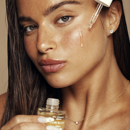 סרום ויטמין סי 15% 'SKIN ELIXIR' להבהרת כתמי פיגמנטציה והענקת זוהר 30 מ"ל - אייקוניקס