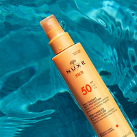 ספריי הגנה מהשמש SPF-50 לפנים ולגוף מסדרת 'סאן' 150 מ"ל - Nuxe
